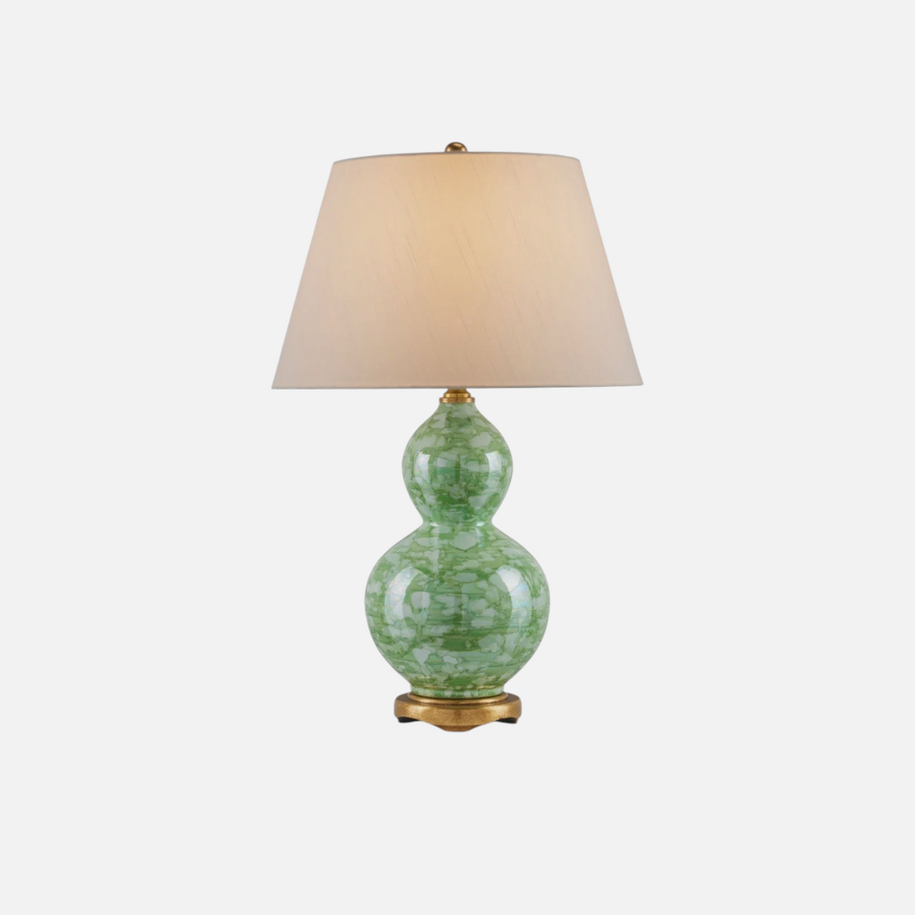 Citrine Home Eau De Nil lamp featuring a green marbled gourd-shaped glass base and a classic beige fabric shade.