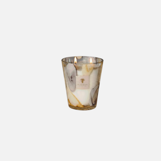 Citrine Home Riviera Eilenroc scented candle in mauve and saffron yellow glass with two lit wicks