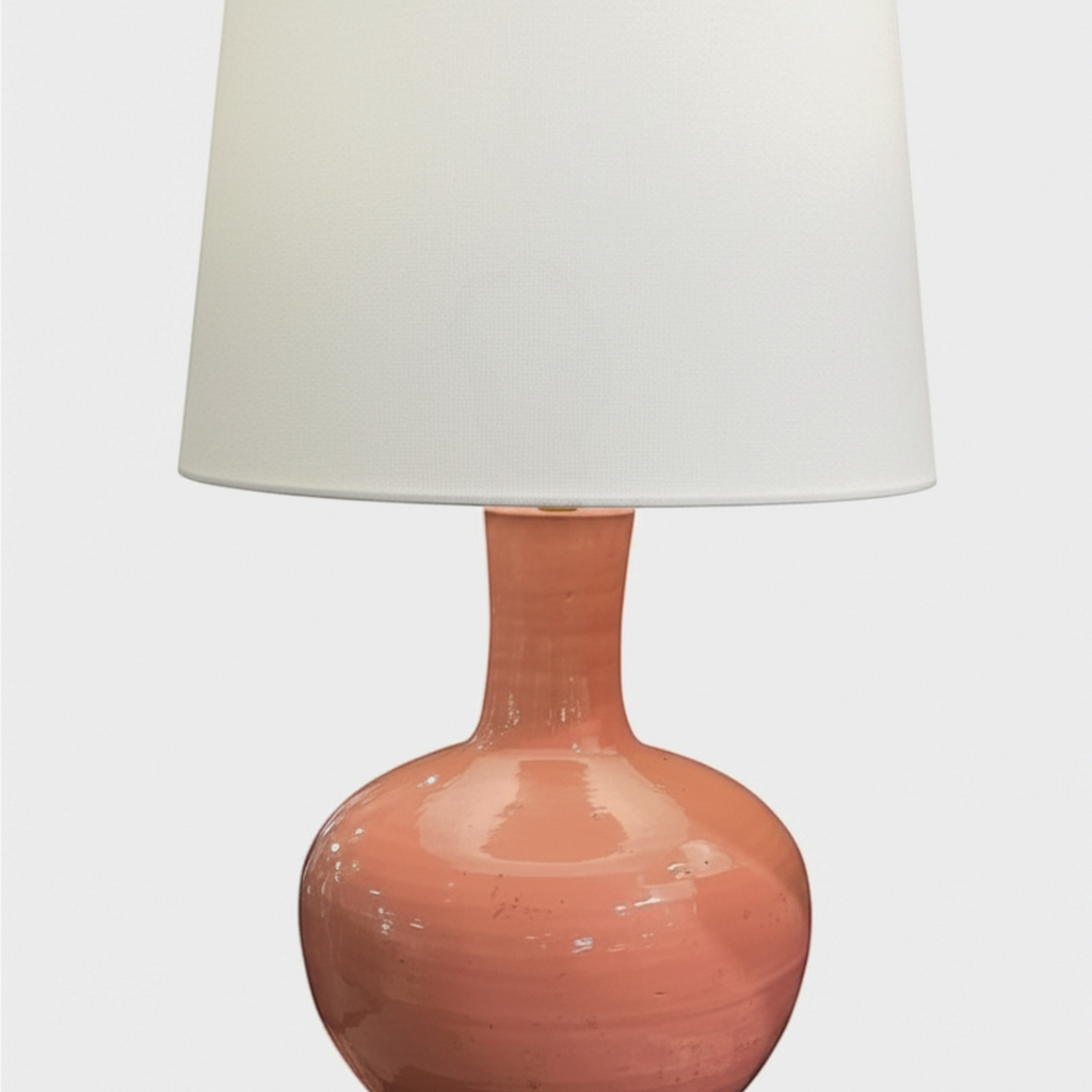 Citrine Home Barclay Butera rustic pink porcelain vase lamp with a white drum shade and a gold-toned base.