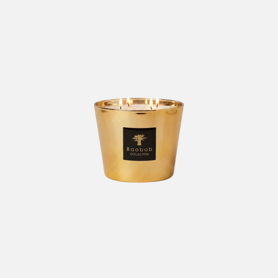 Citrine Home Les Exclusives Aurum scented candle in a metallic gold glass vessel with a black Baobab Collection label