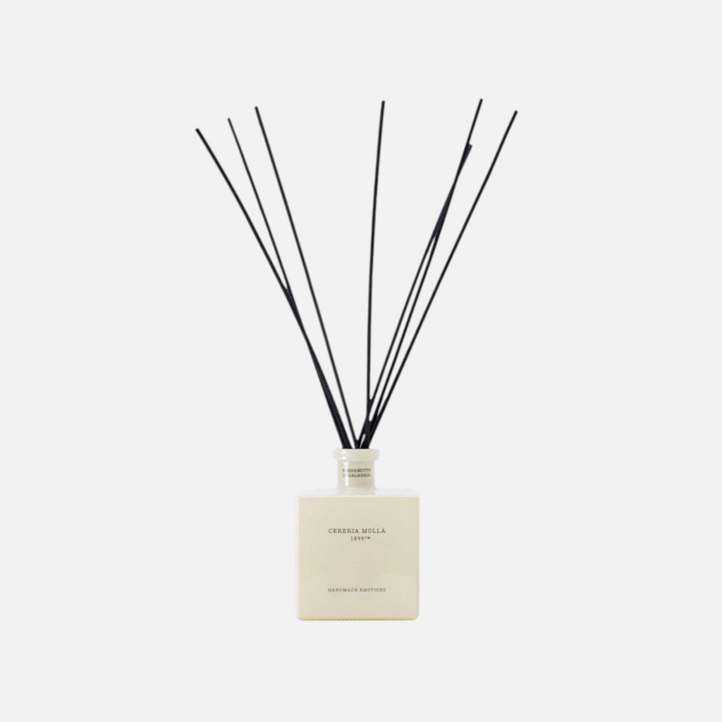 Citrine Home Bergamotto di Calabria reed diffuser in a square cream glass bottle with black reeds