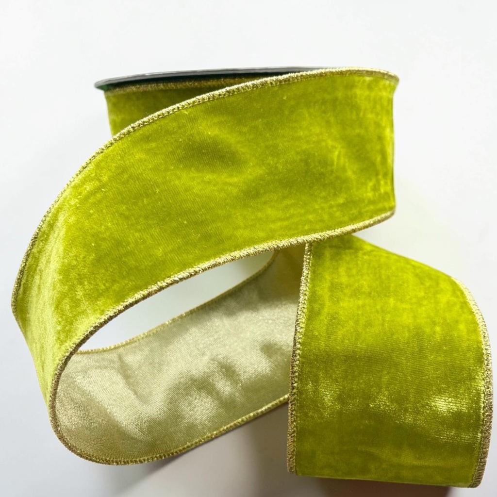 Citrine Home 4 inch wide apple green velvet ribbon with gold metallic edges on a spool