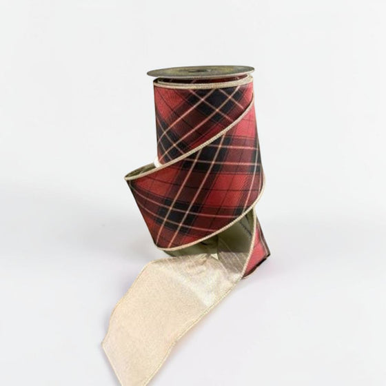 Citrine Home 4-inch burgundy plaid ribbon on a spool with a metallic gold underside for holiday gift wrapping.