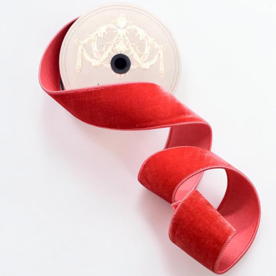 Citrine Home coral lush velvet ribbon on a spool, 2.5 inches wide, perfect for elegant gift wrapping and decor.