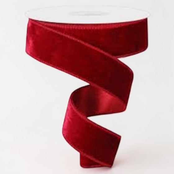 Citrine Home cranberry red unwoven velvet holiday ribbon on a spool, 1.5 inch wide.