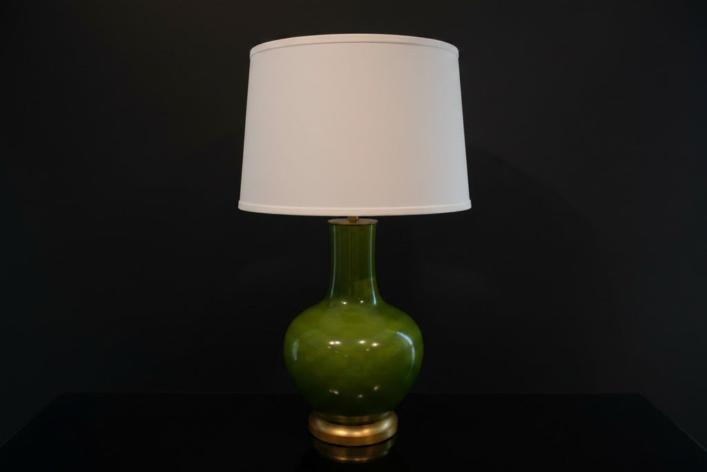 Citrine Home vintage green crackle glaze porcelain bottle lamp with a gilt base and white drum shade.