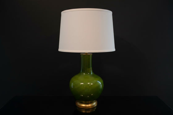 Citrine Home vintage green crackle glaze porcelain bottle lamp with a gilt base and white drum shade.
