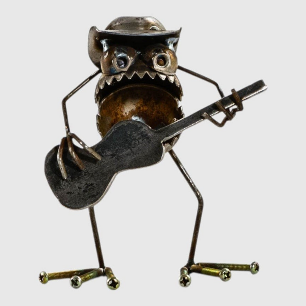 Citrine Home 6-inch metal cowboy figurine playing a guitar, crafted from recycled hardware and scrap metal parts.