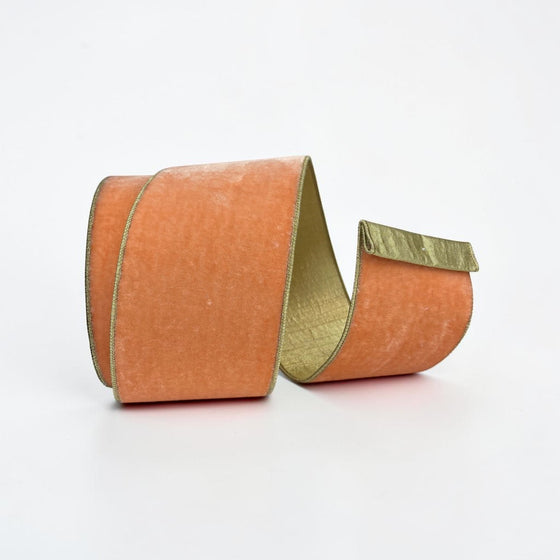 Citrine Home 4-inch wide orange velvet ribbon with metallic gold edges on a white background.