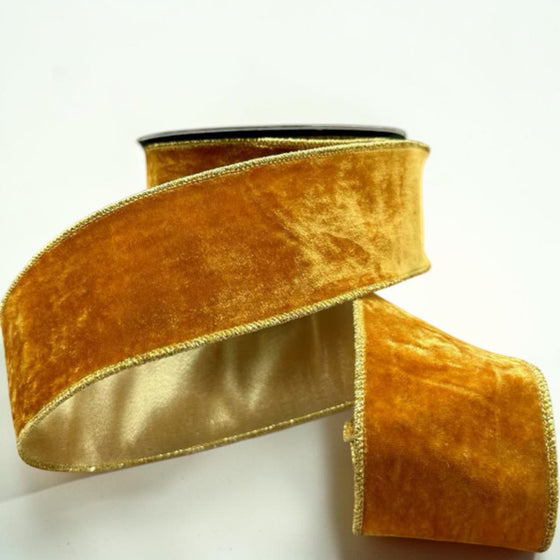 Citrine Home 2.5 inch wide persimmon orange vintage velvet ribbon with gold metallic edges on a spool