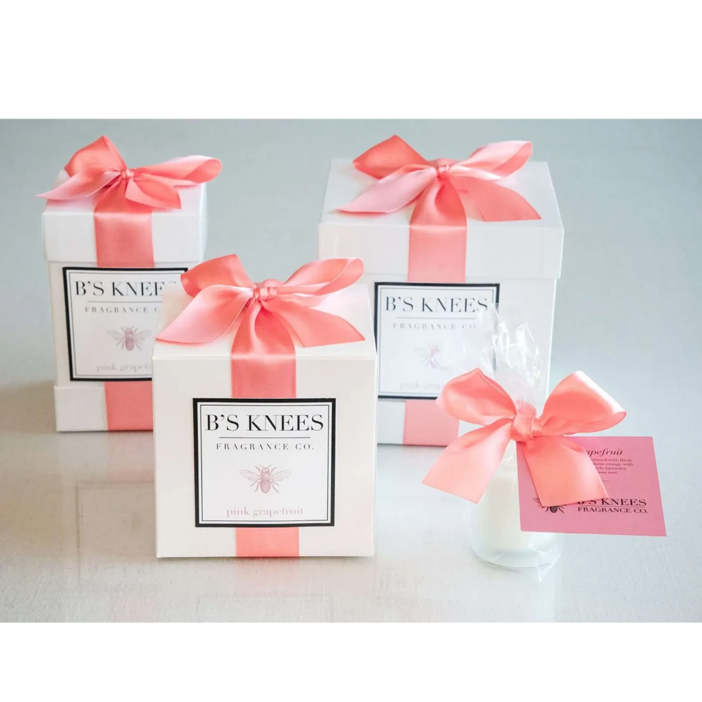 Citrine Home Pink Grapefruit scented candle gift set in white boxes with coral pink satin ribbons.