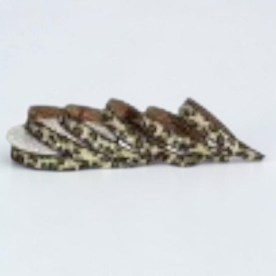 Citrine Home 1-inch wide faux leather ribbon featuring a beige and brown safari animal print pattern