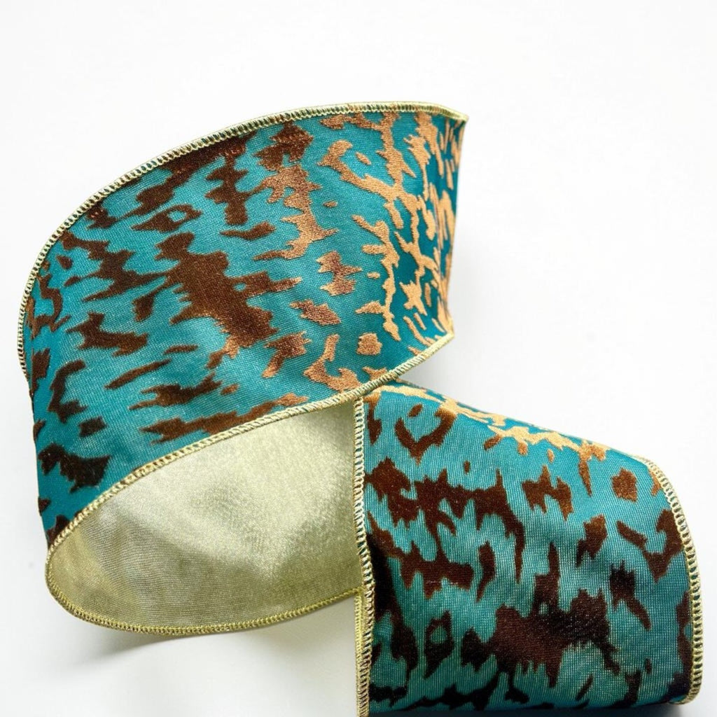 Citrine Home 4-inch wide dark teal and copper velvet ribbon with a metallic animal print pattern and gold edges.