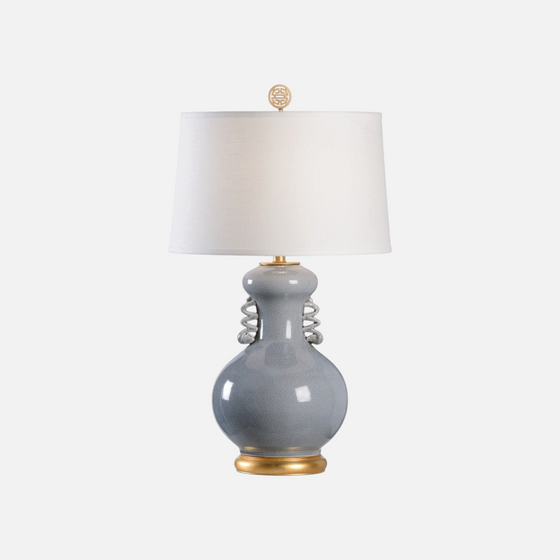 Citrine Home Chan table lamp with a slate gray crackle glazed ceramic body, gold base, and off-white drum shade.
