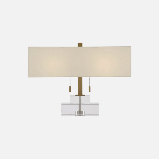 Citrine Home Chiara table lamp with a rectangular off-white shade, brass stem, and clear glass base.