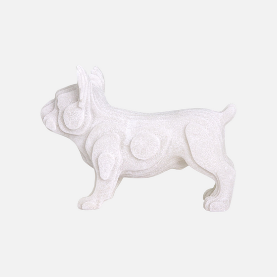 Citrine Home white pug statue with intricate quartz sand etched texture and layered design, side view.